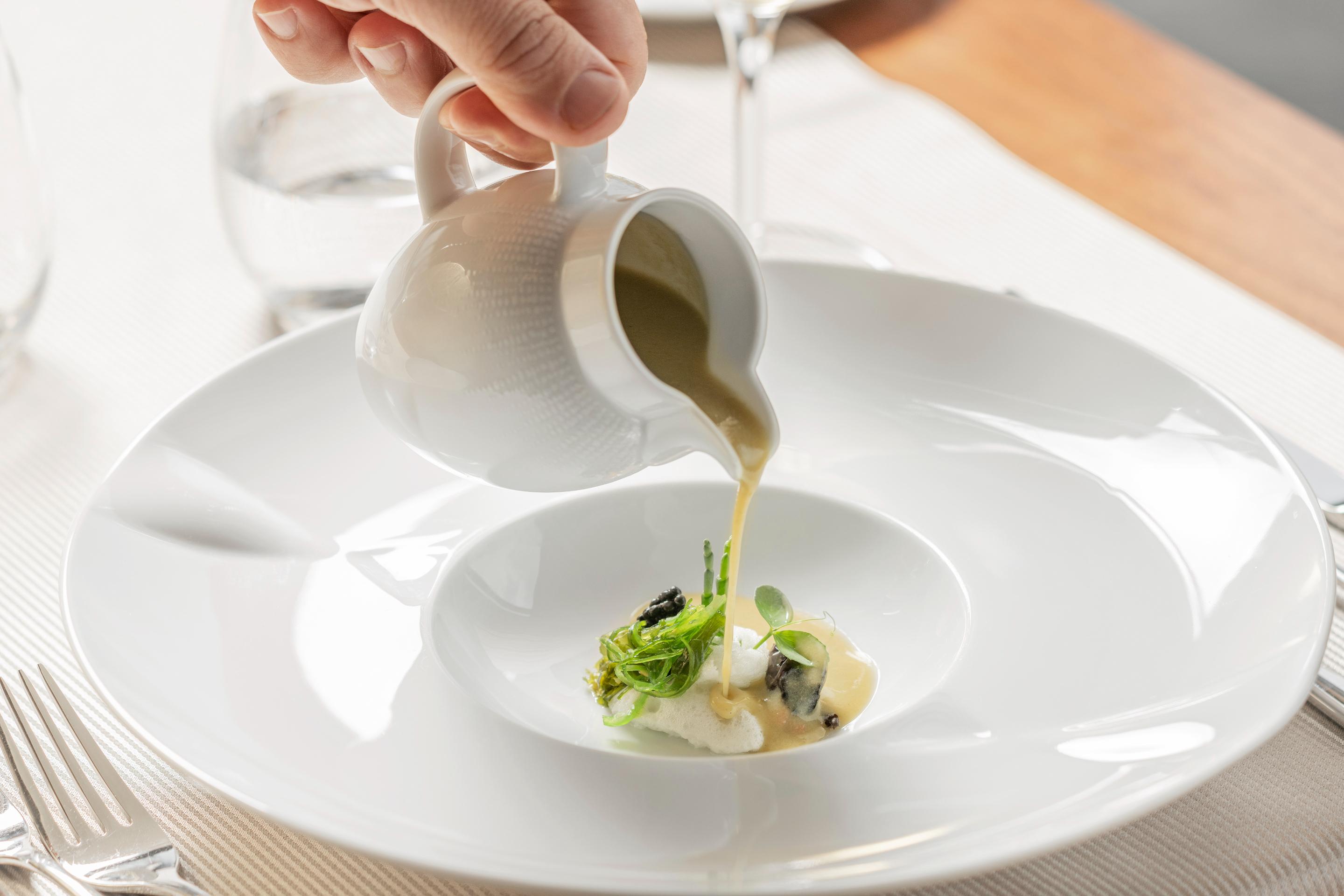 Grand Hotel Acores Atlantico Ponta Delgada  Luaran gambar A sauce being poured onto a plate of food